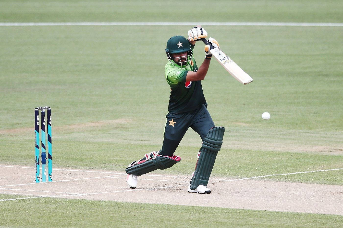 Babar Azam Hitting The Ball Wallpaper