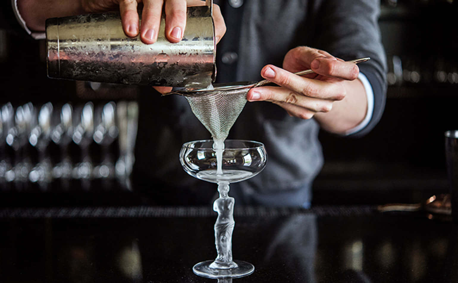 Bartender With Cocktail Strainer Wallpaper