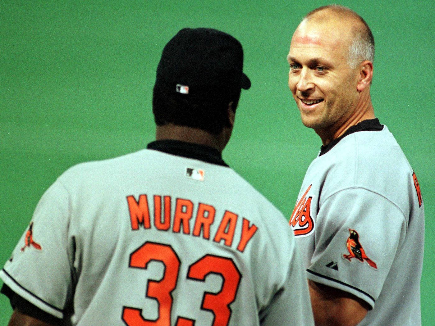 Baseball Legends Cal Ripken Jr And Eddie Murray In A Candid Moment Wallpaper