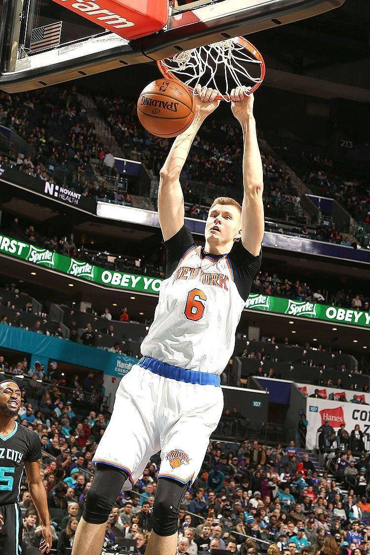 Basketball Player Kristaps Porzingis Dunk Wallpaper