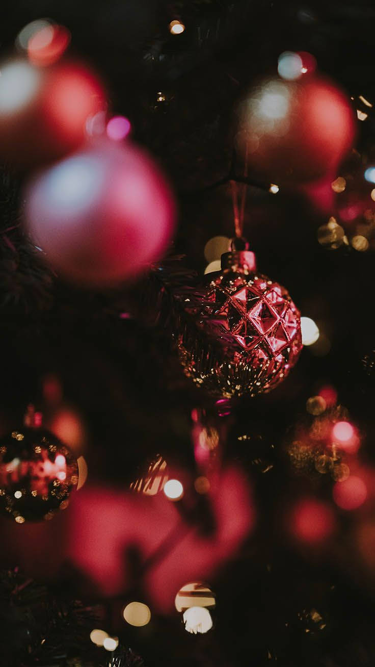 Beautiful Hanging Dark Pink Festive Christmas Balls Wallpaper