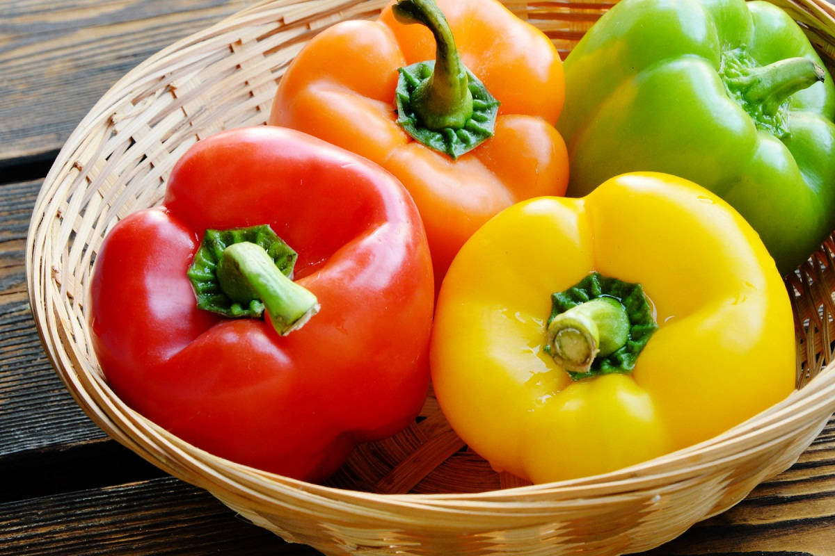 Bell Pepper Fruits On Rattan Basket Wallpaper