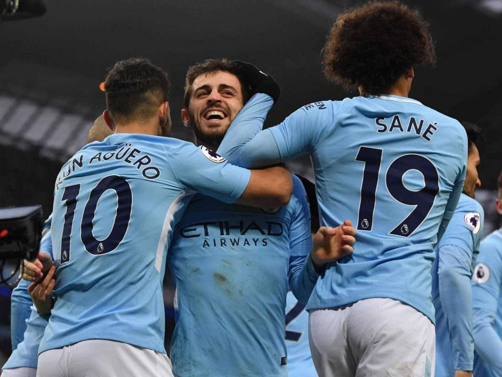 Bernardo Silva Hugging His Teammates Wallpaper