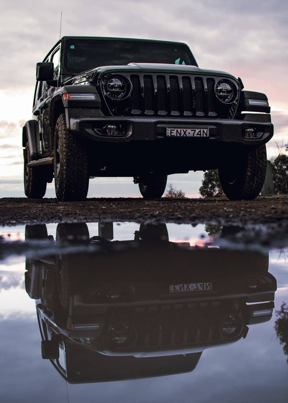 Black Jeep Wrangler Reflection On Water Wallpaper