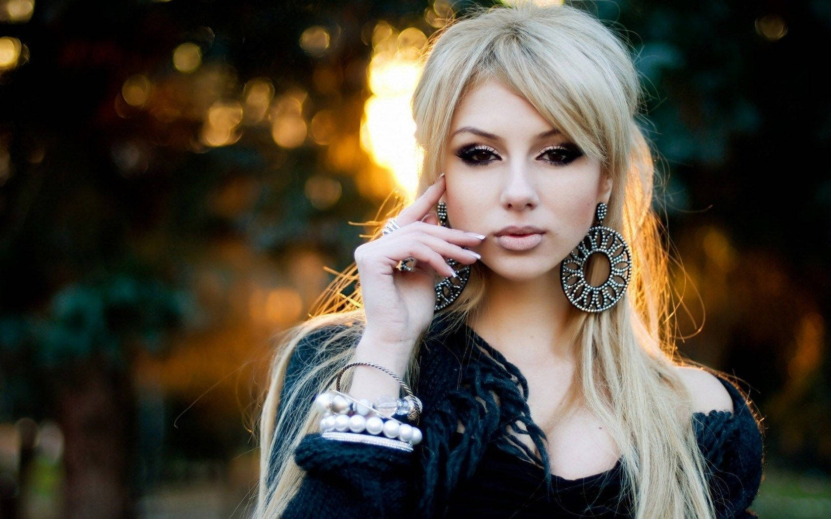 Blonde Girl Big Earrings Wallpaper