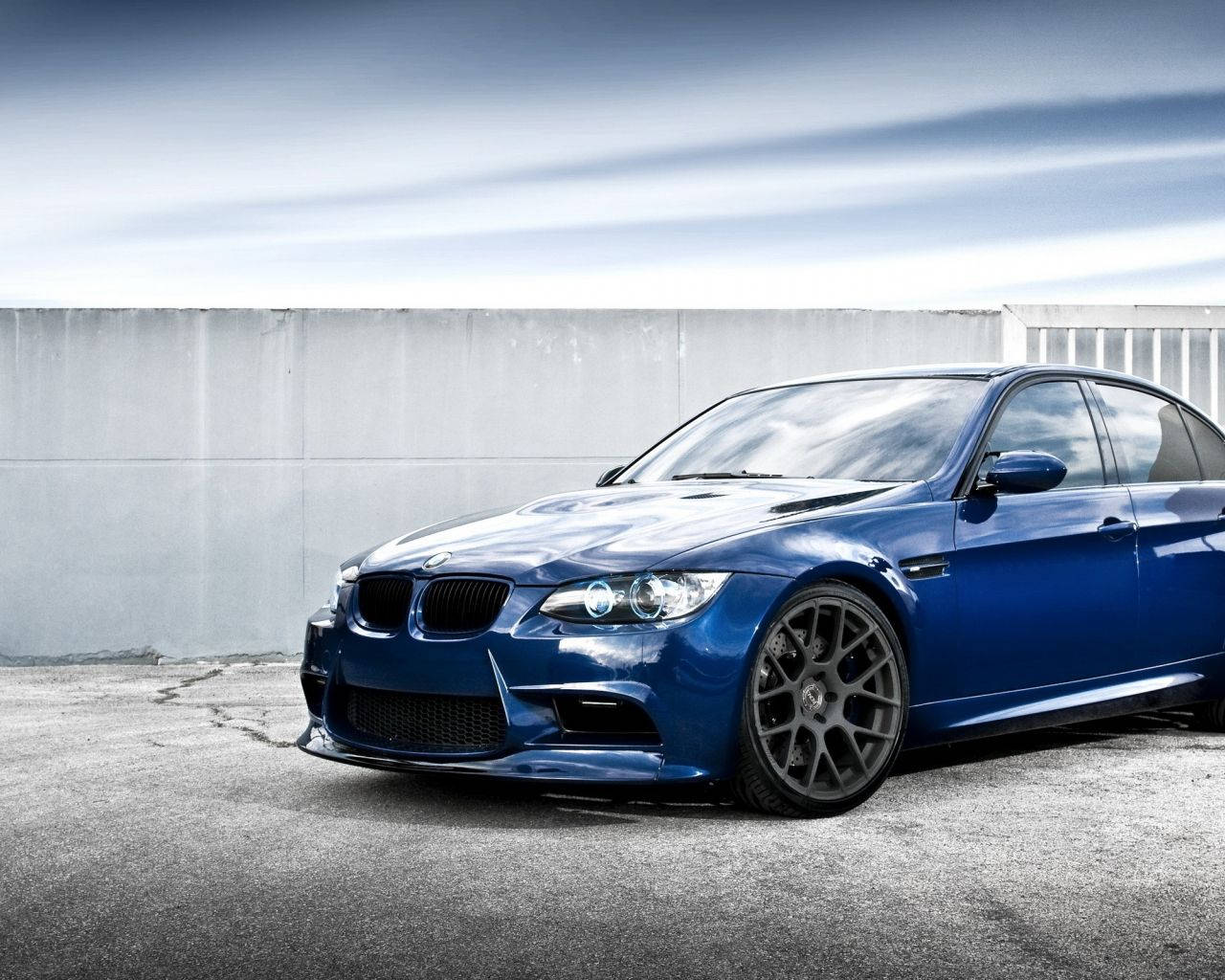 Blue Bmw In A Roof Deck Wallpaper