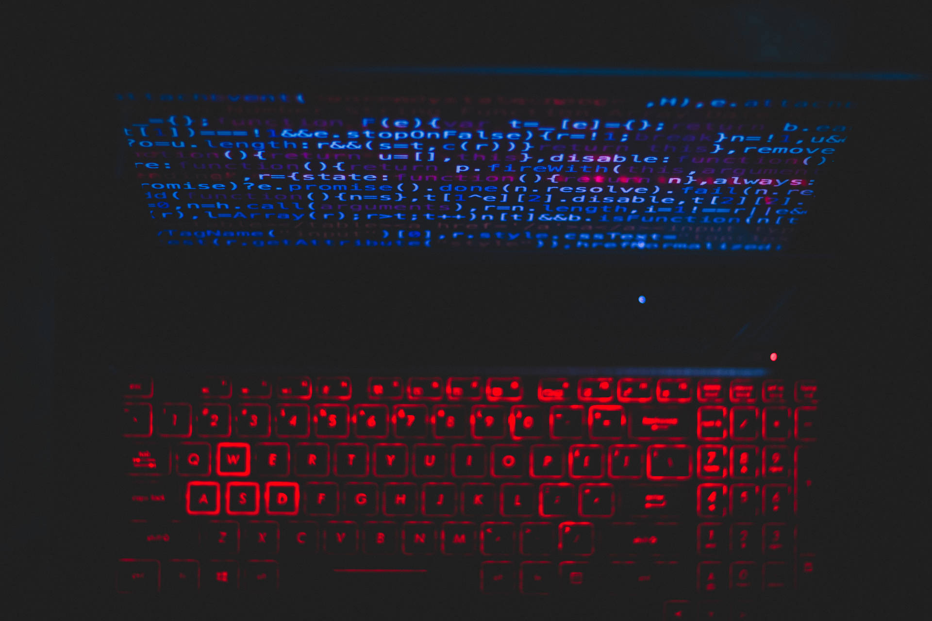 Blue Computer Screen And Red Keyboard Wallpaper