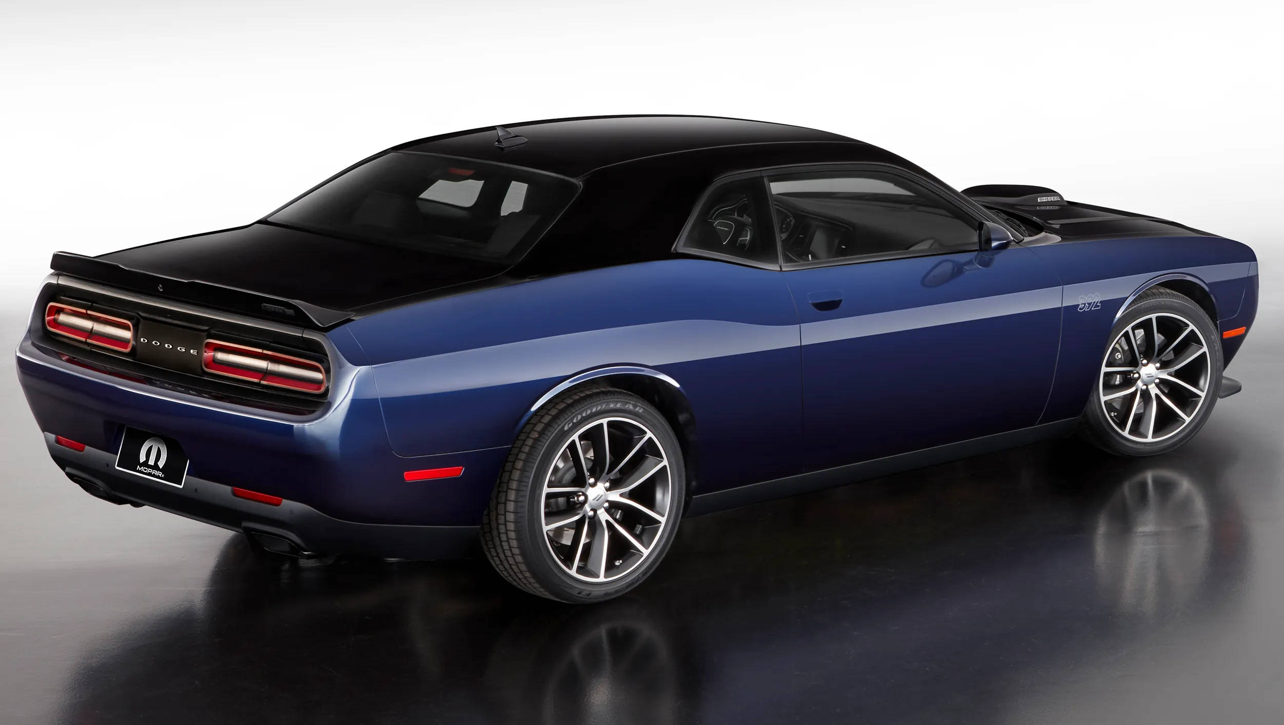 Blue Dodge Challenger In A Showroom Wallpaper