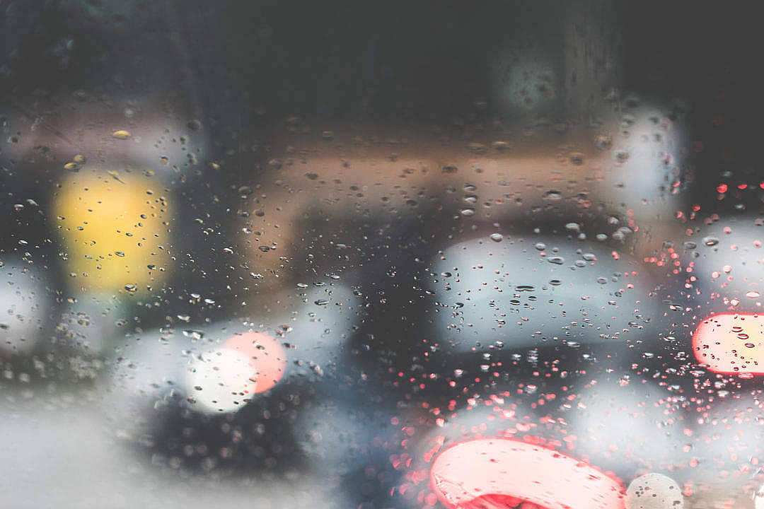 Blurry Busy Street While It's Raining Wallpaper