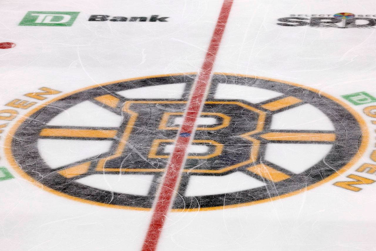 Boston Bruins Logo On Skating Rink Wallpaper