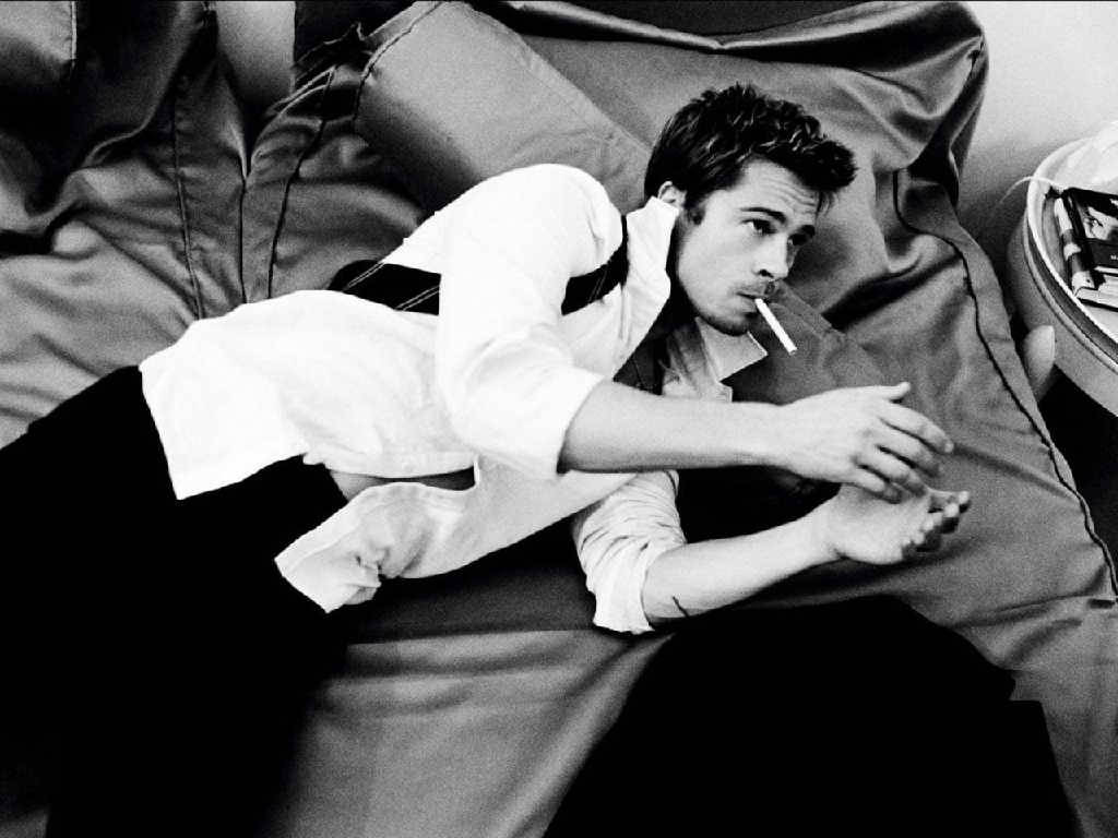 Brad Pitt Lounging In Bed Wallpaper