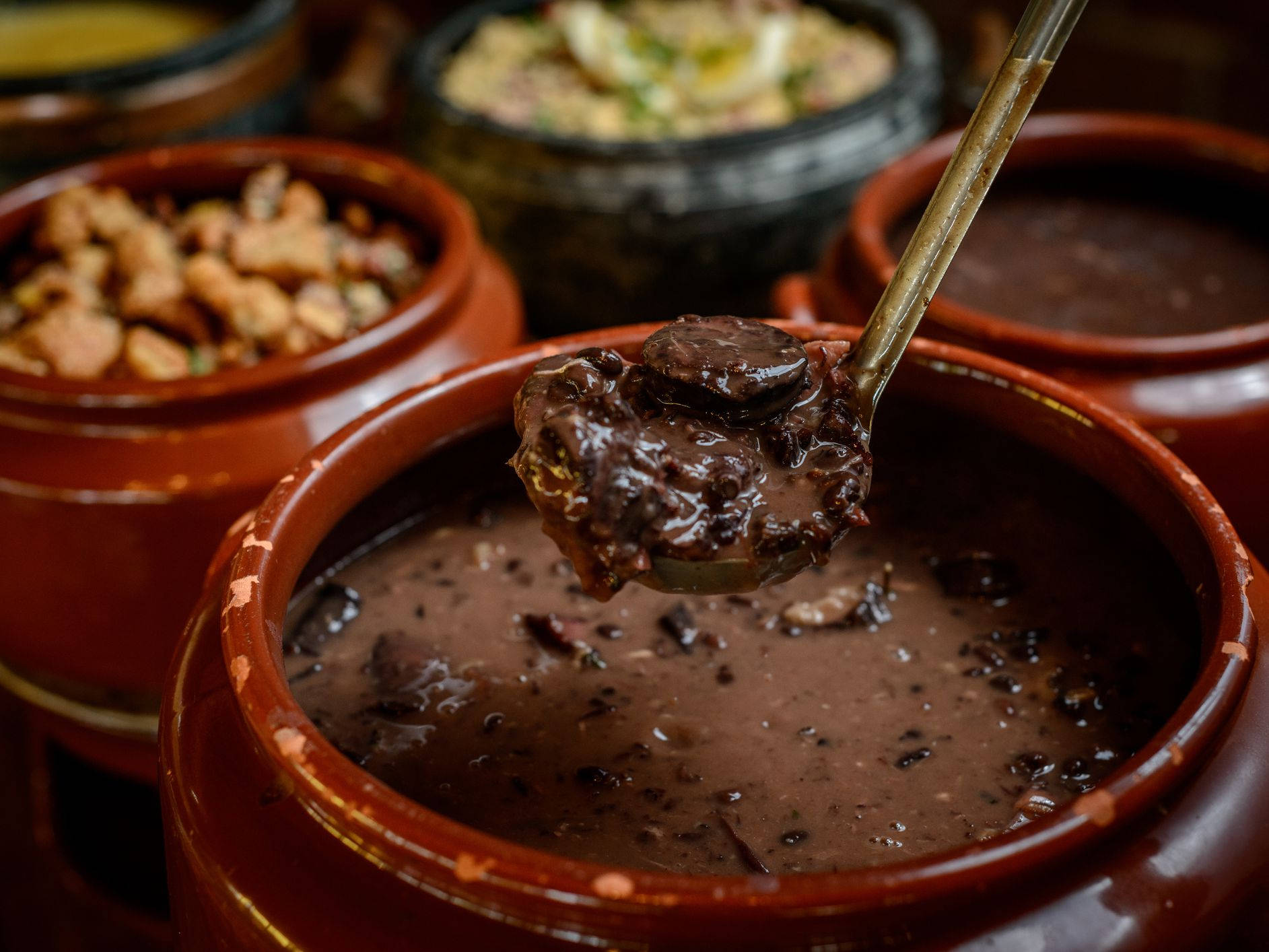 Brazilian Black Bean Stew Feijoada In Red Pot Wallpaper