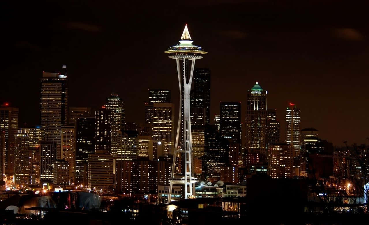 Breathtaking View Of Seattle Skyline At Dawn Wallpaper