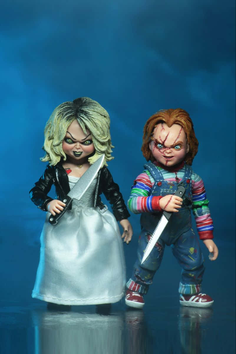 Brideand Chucky Dolls With Knives Wallpaper