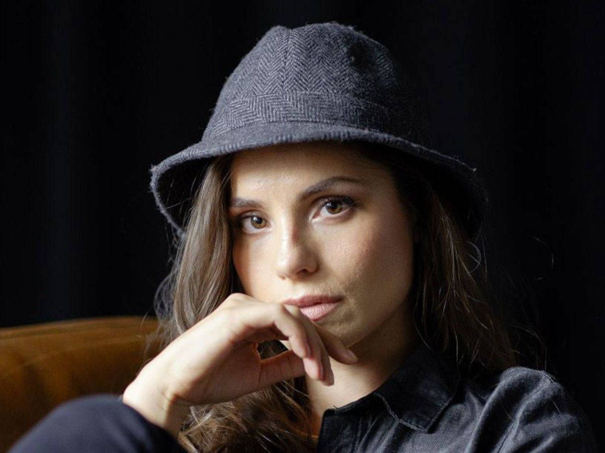 British Actress Charlotte Riley, Donning A Chic Cap Wallpaper