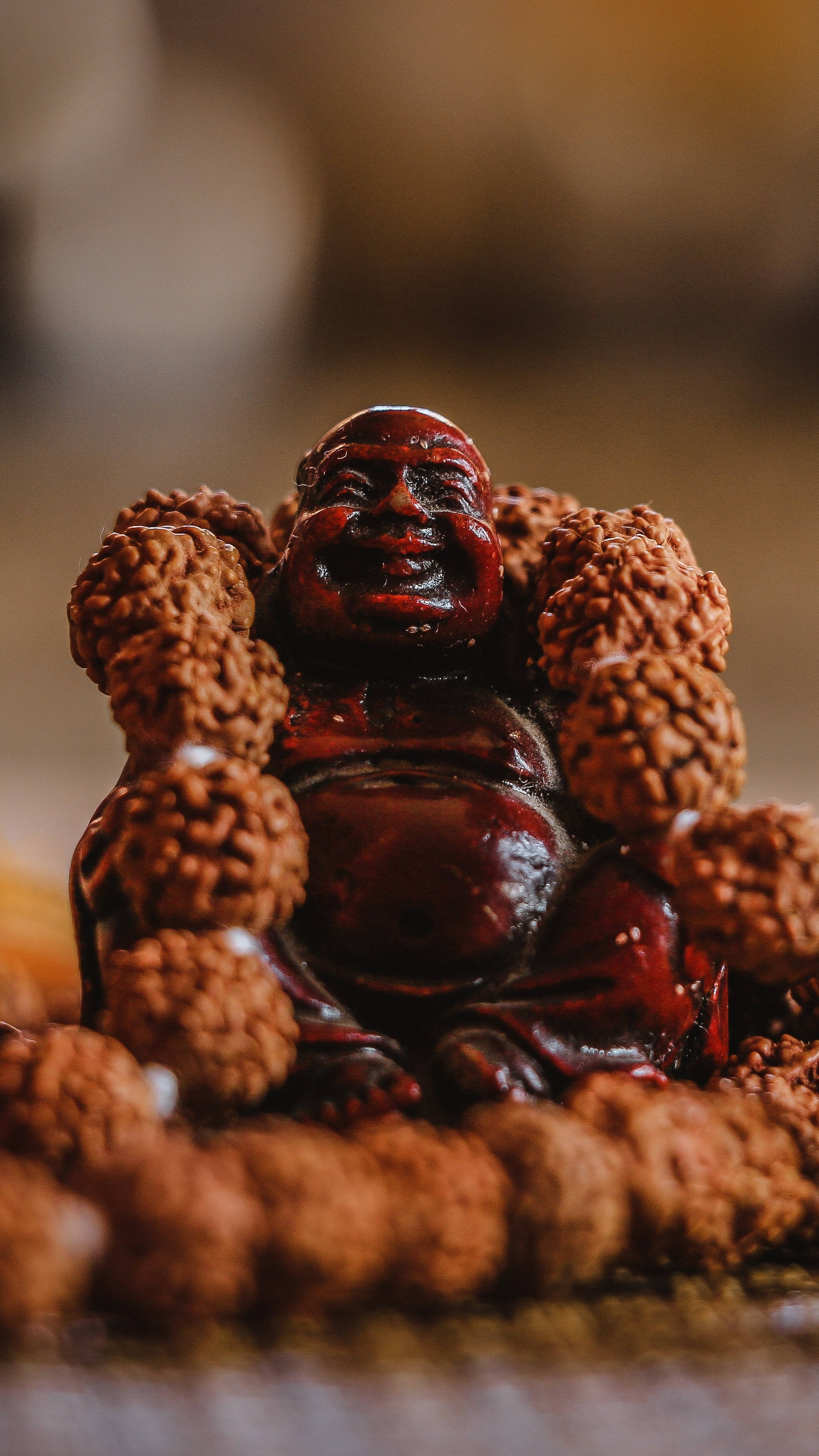 Brown Laughing Buddha Statue Wallpaper