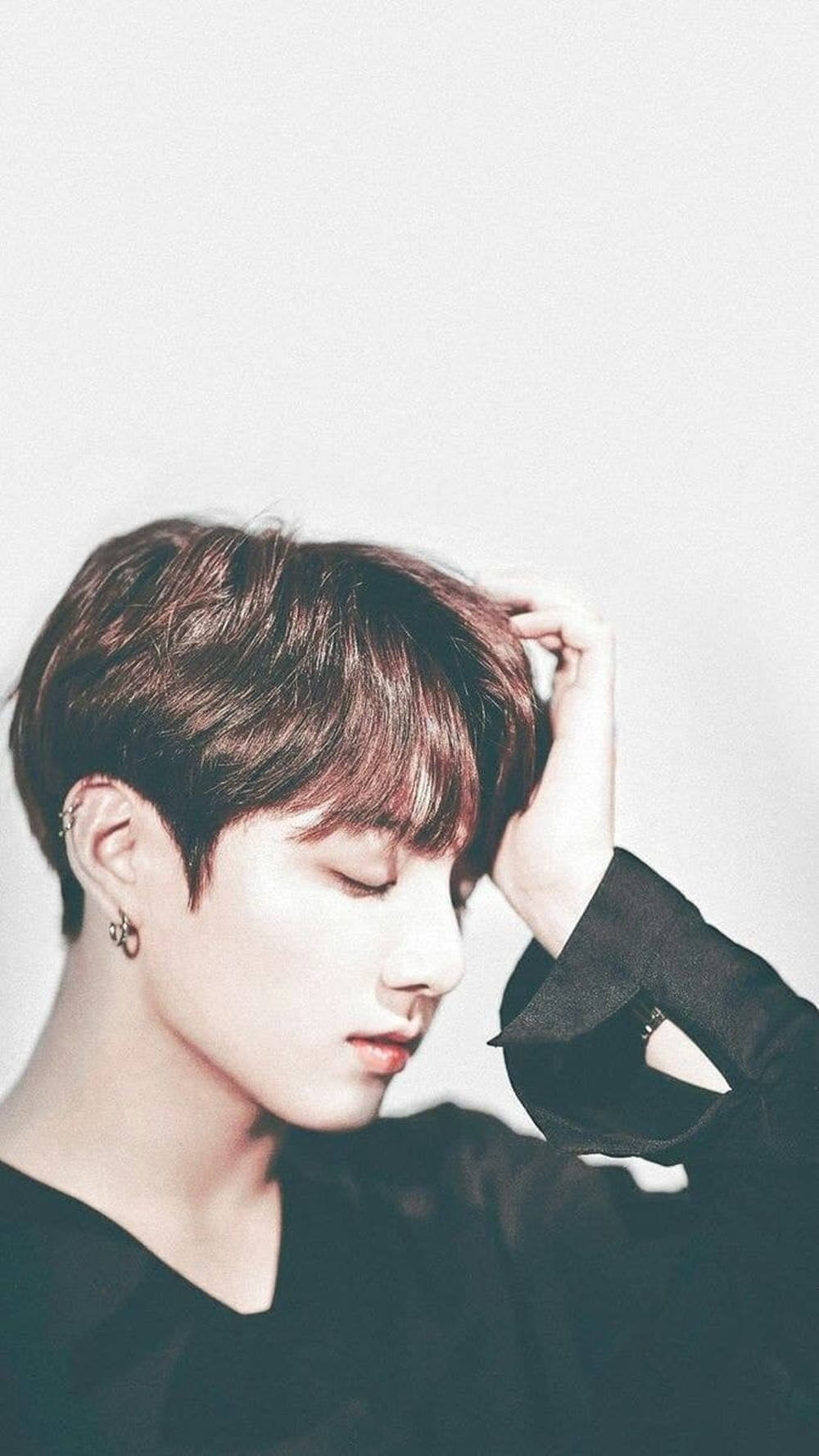 Bts Jk Dramatic Pose Shot Wallpaper