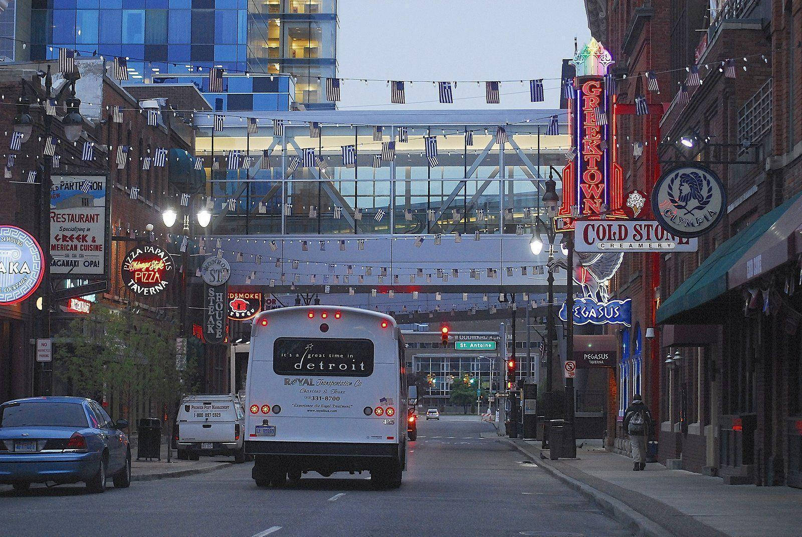 Bustling City Life In Detroit Greektown Wallpaper