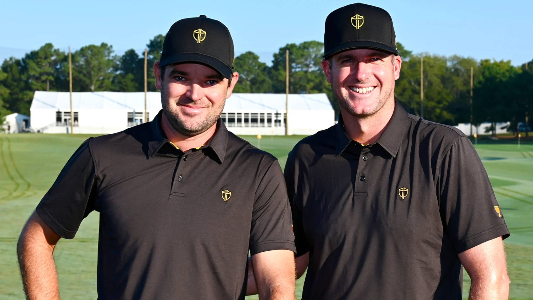 Canadian Golfers Corey Conners And Taylor Pendrith Smiling On The Course Wallpaper