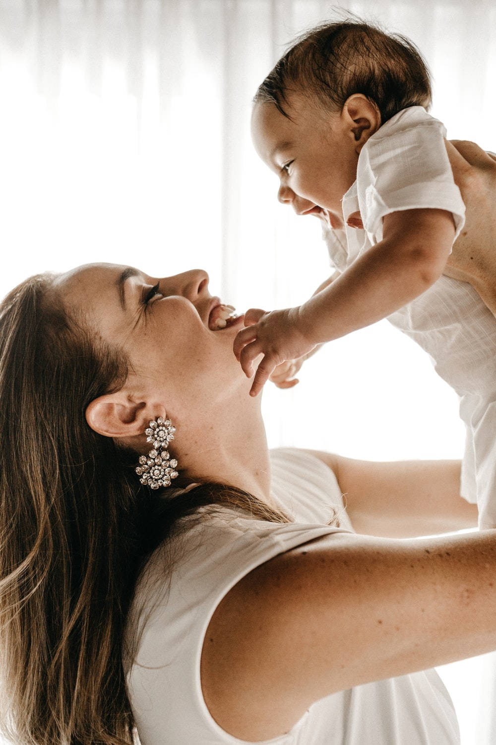 Caption: A Tender Moment Between Mother And Child Wallpaper