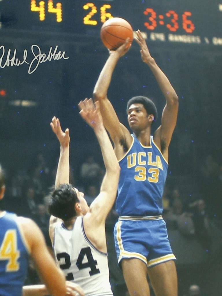 Caption: Basketball Legend Kareem Abdul Jabbar In His Ucla Team Days. Wallpaper