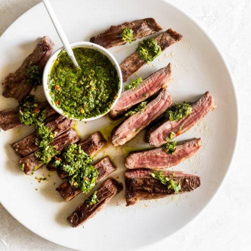 Caption: Delectable Churrasco With Chimichurri Sauce Wallpaper