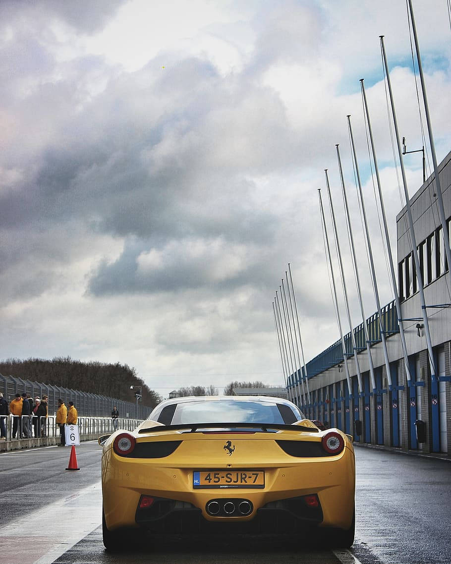 Caption: Luxury In The Palm - The Ferrari Phone Wallpaper