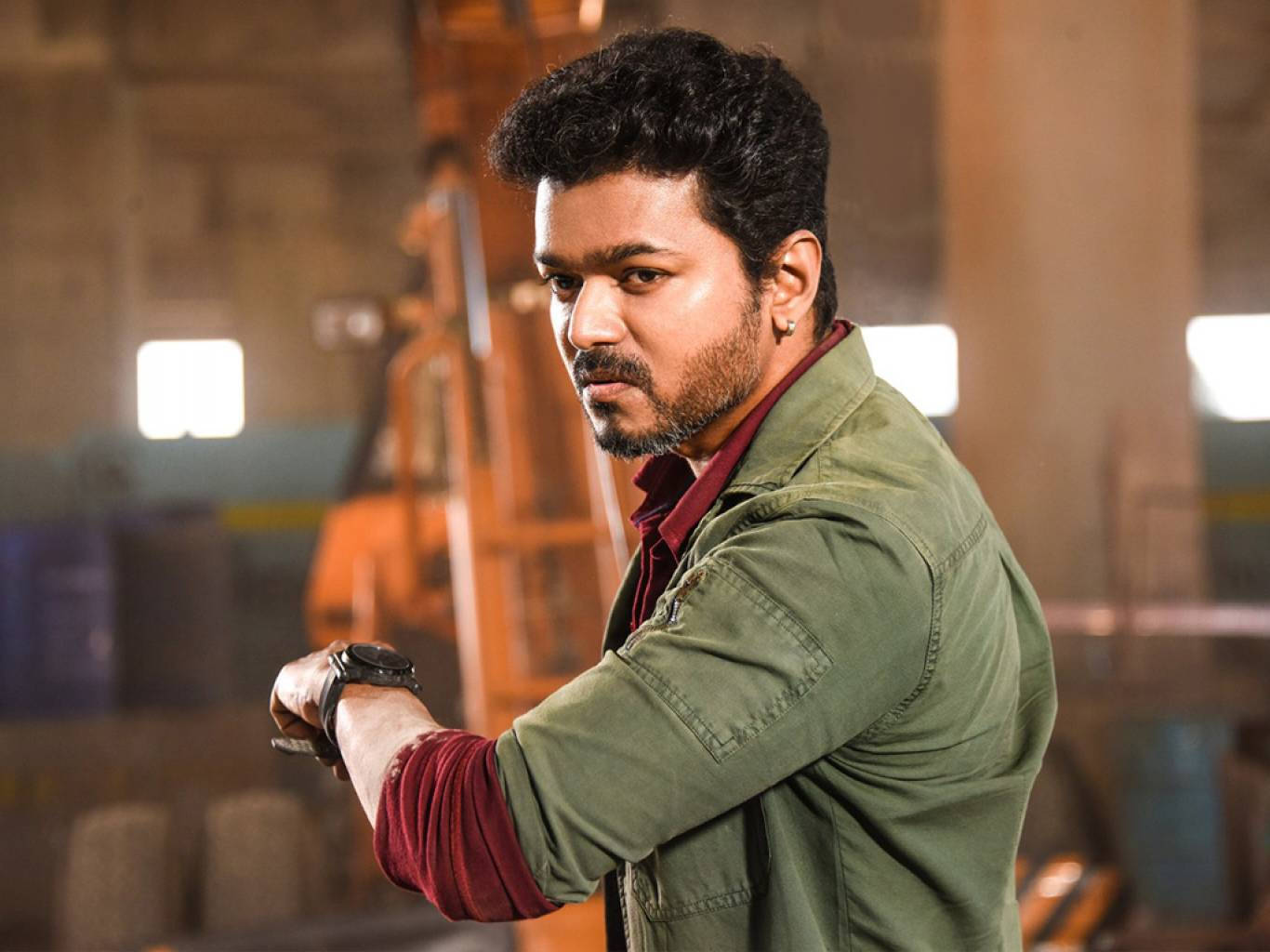 Caption: Master Vijay Posing In Warehouse Wallpaper