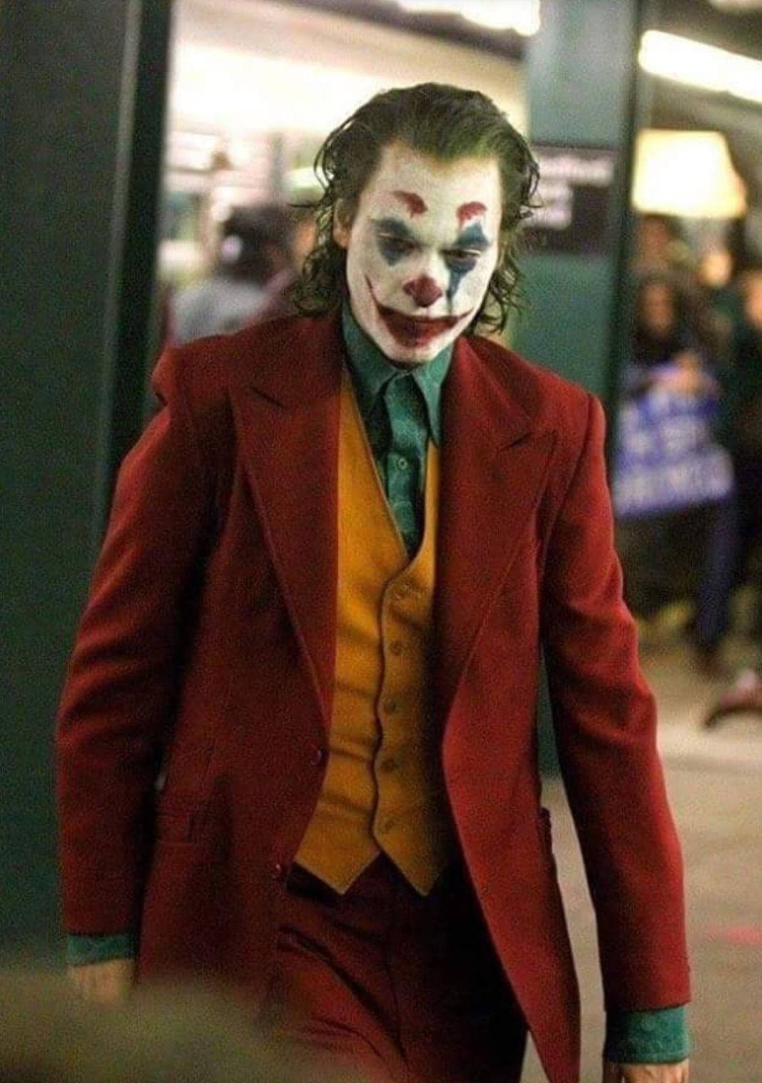Caption: Menacing And Mesmerizing – Joaquin Phoenix As Joker In 2019 Wallpaper