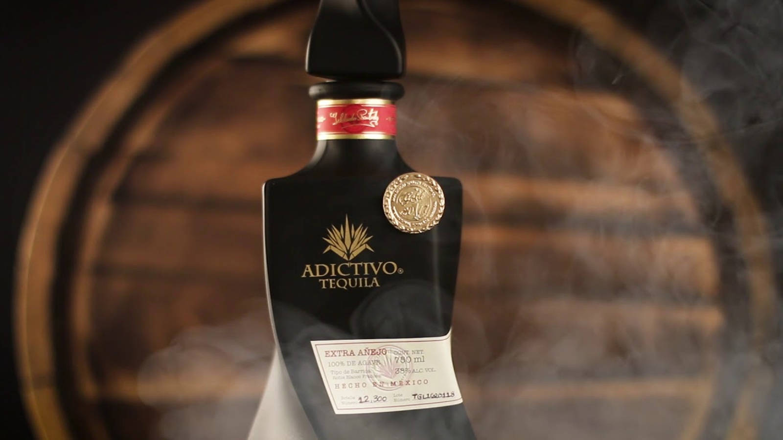 Caption: Premium Adictivo Extra Anejo Black Tequila - A Luxury Statement Wallpaper