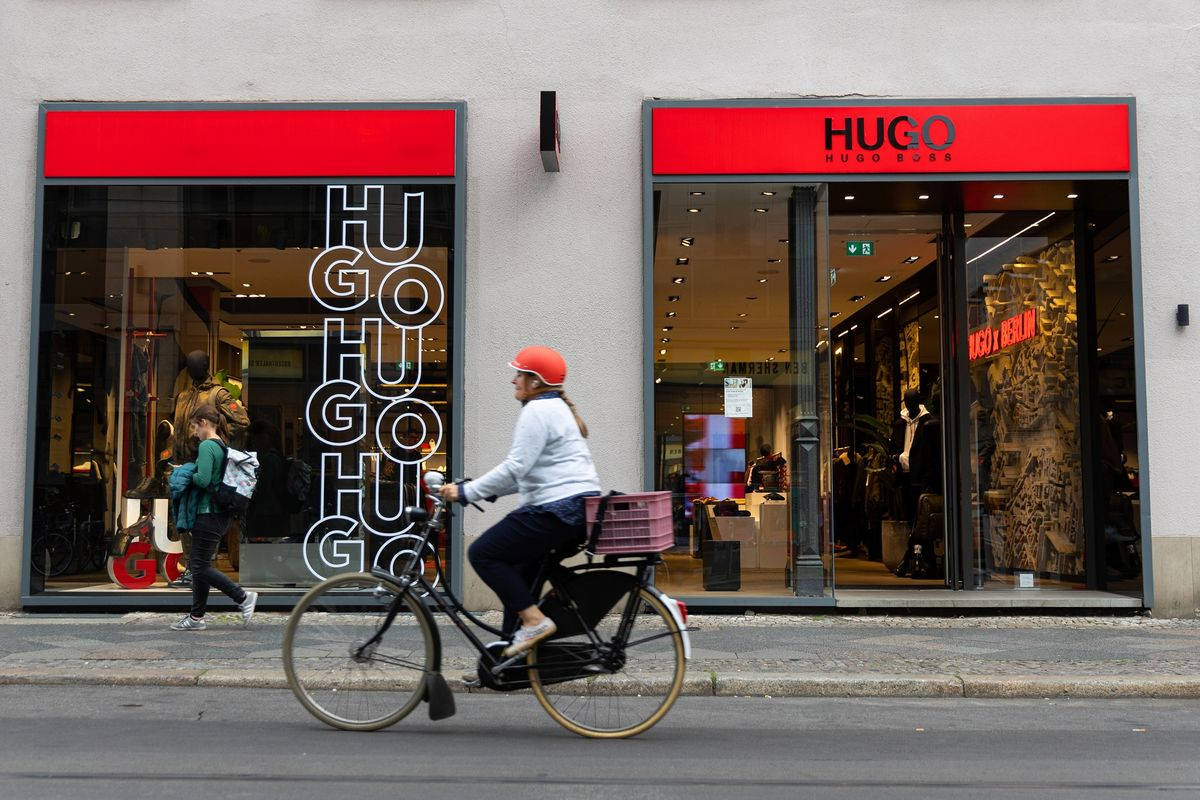 Caption: Sleek Hugo Boss Red Logo Displayed At Boutique Wallpaper