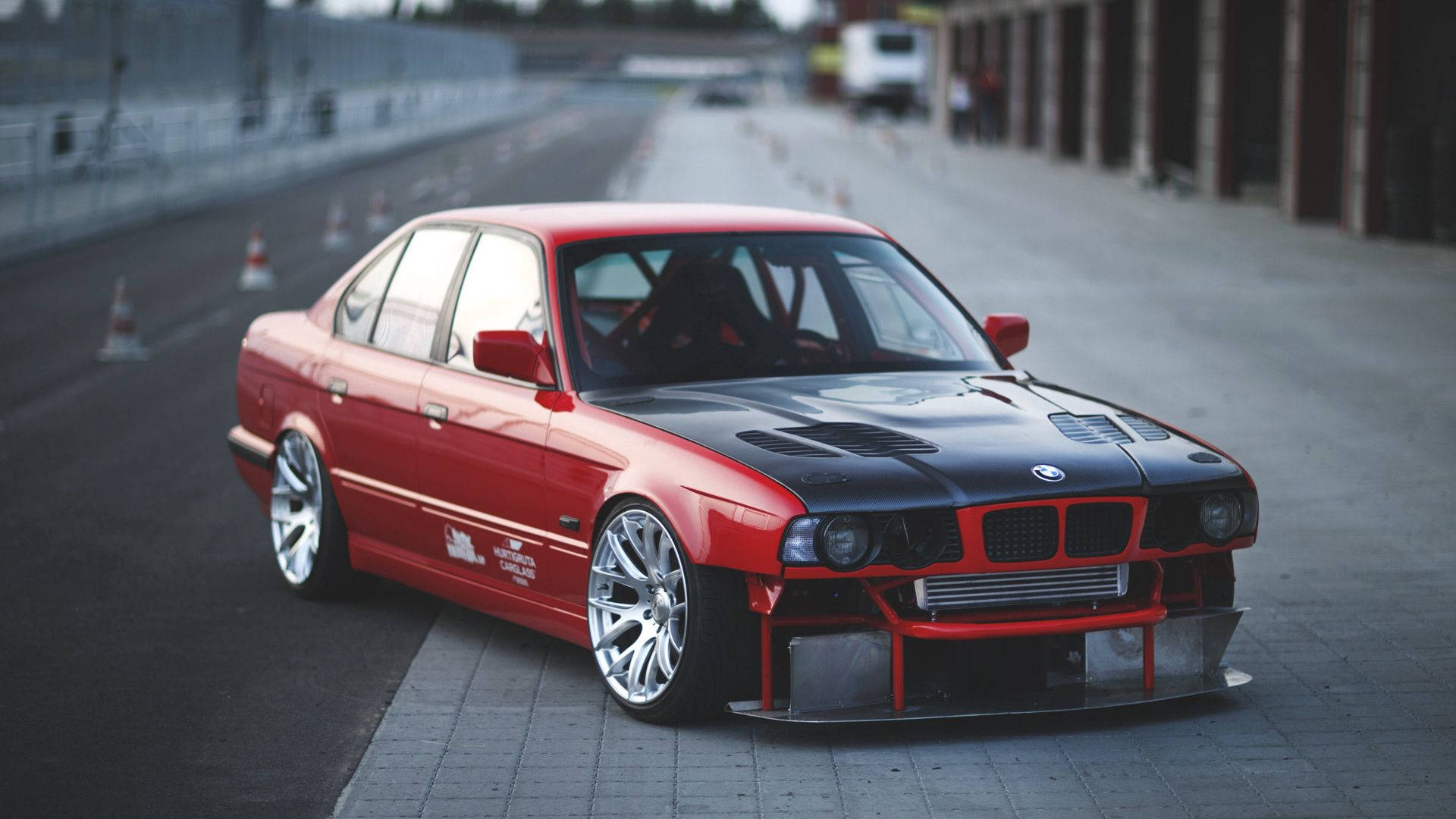 Caption: Striking Red Bmw E34 In Full Hd Wallpaper