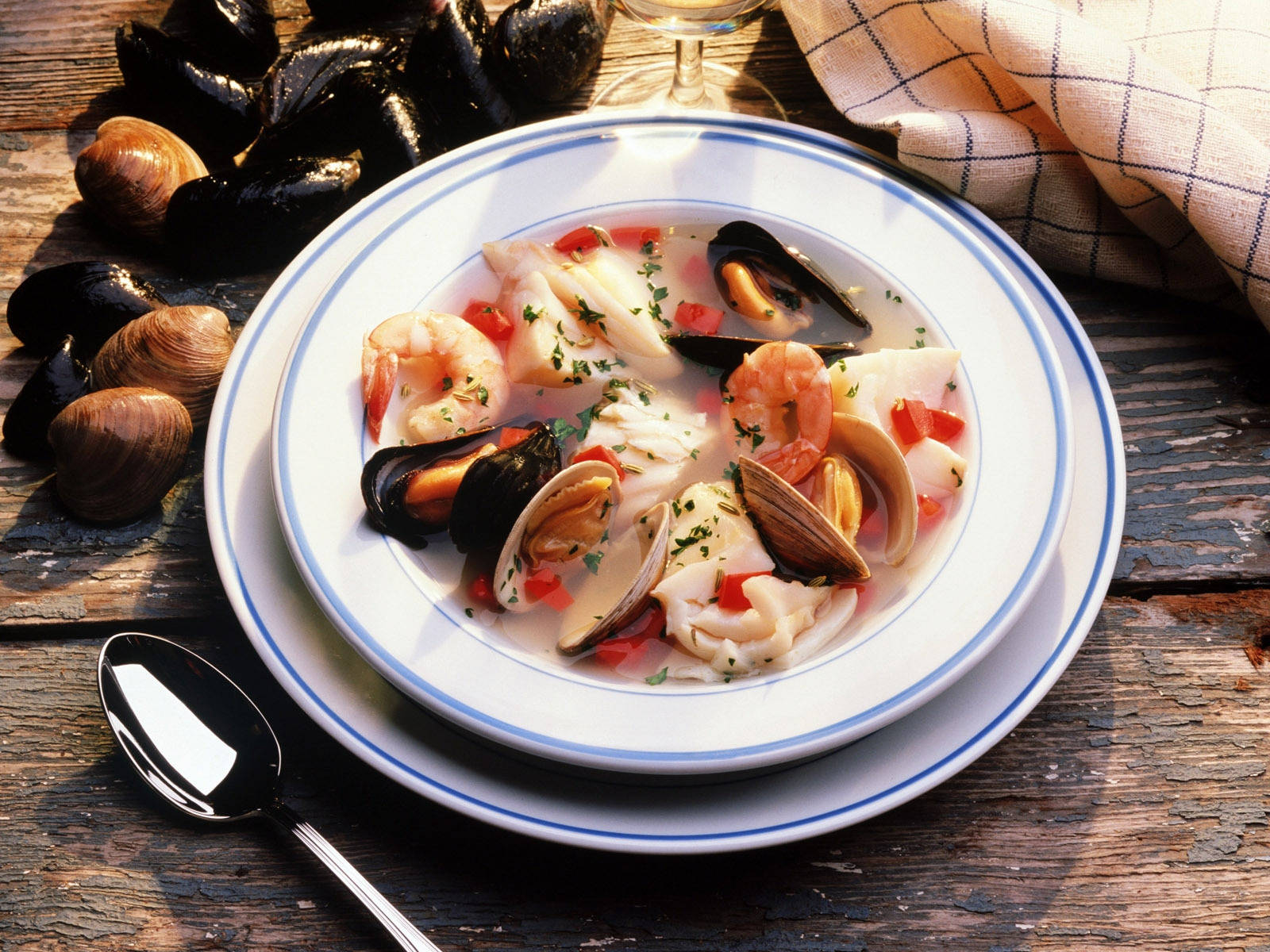 Caption: Succulent Mussels And Clams Seafood Soup Wallpaper