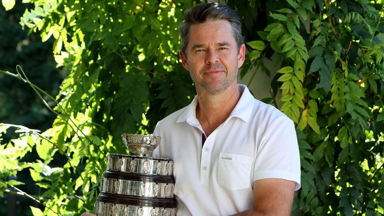 Caption: Todd Woodbridge Holding The Prestigious Davis Cup Wallpaper