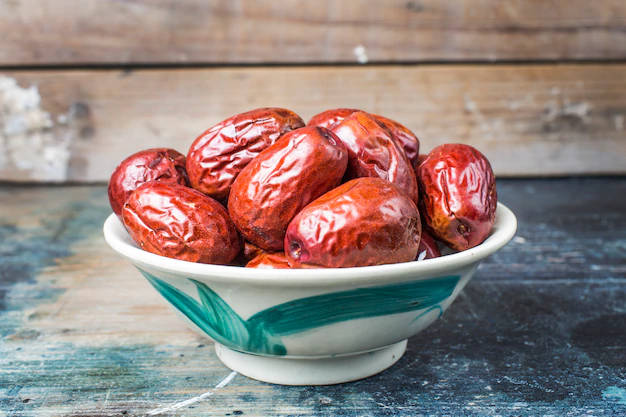 Caption: Vibrant Bowl Of Jujube Seeds Wallpaper