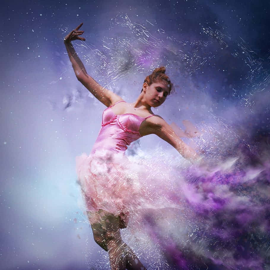 Captivating Ballerina In Pink Dress Wallpaper