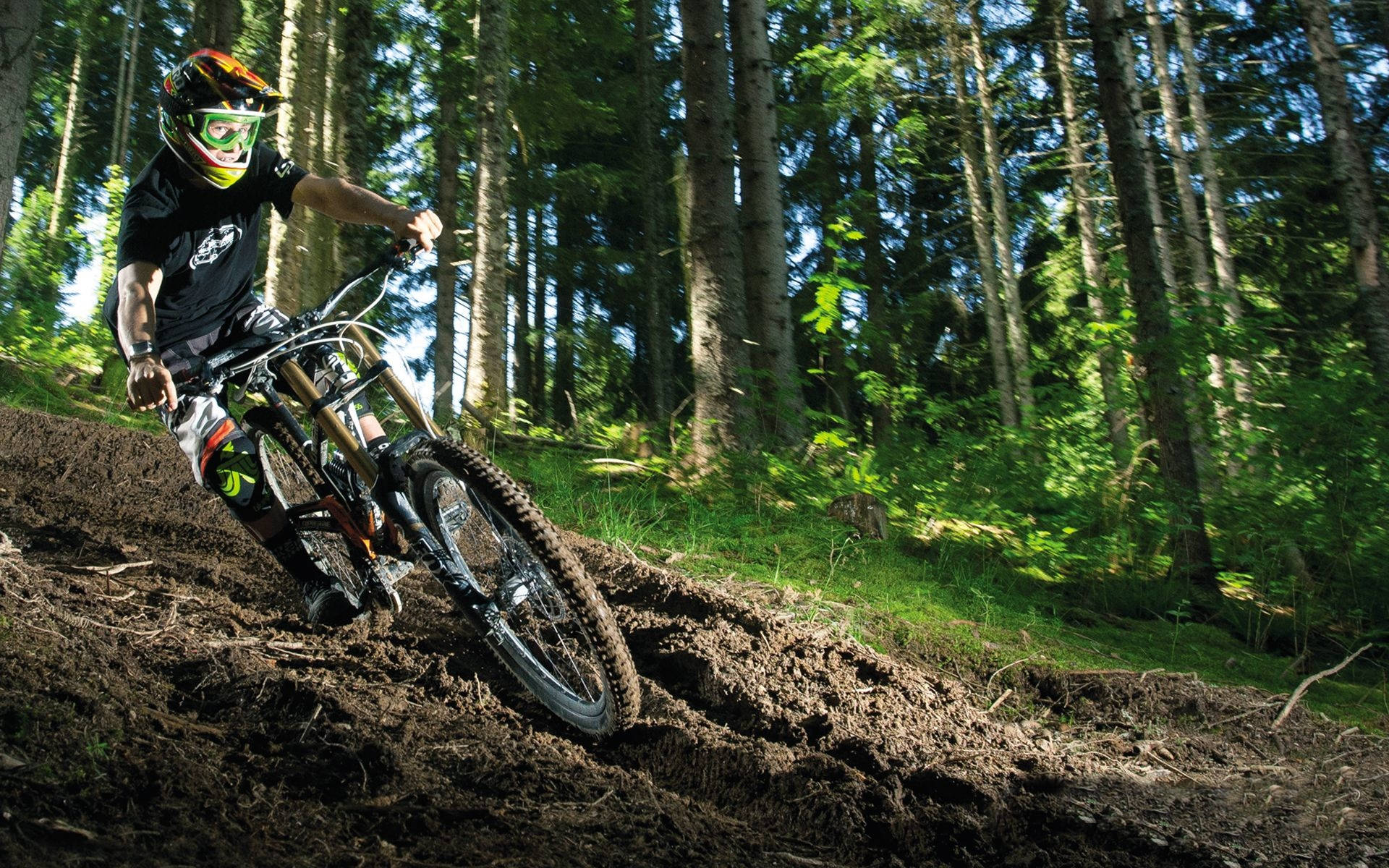 Captivating Mountain Biking Adventure Wallpaper