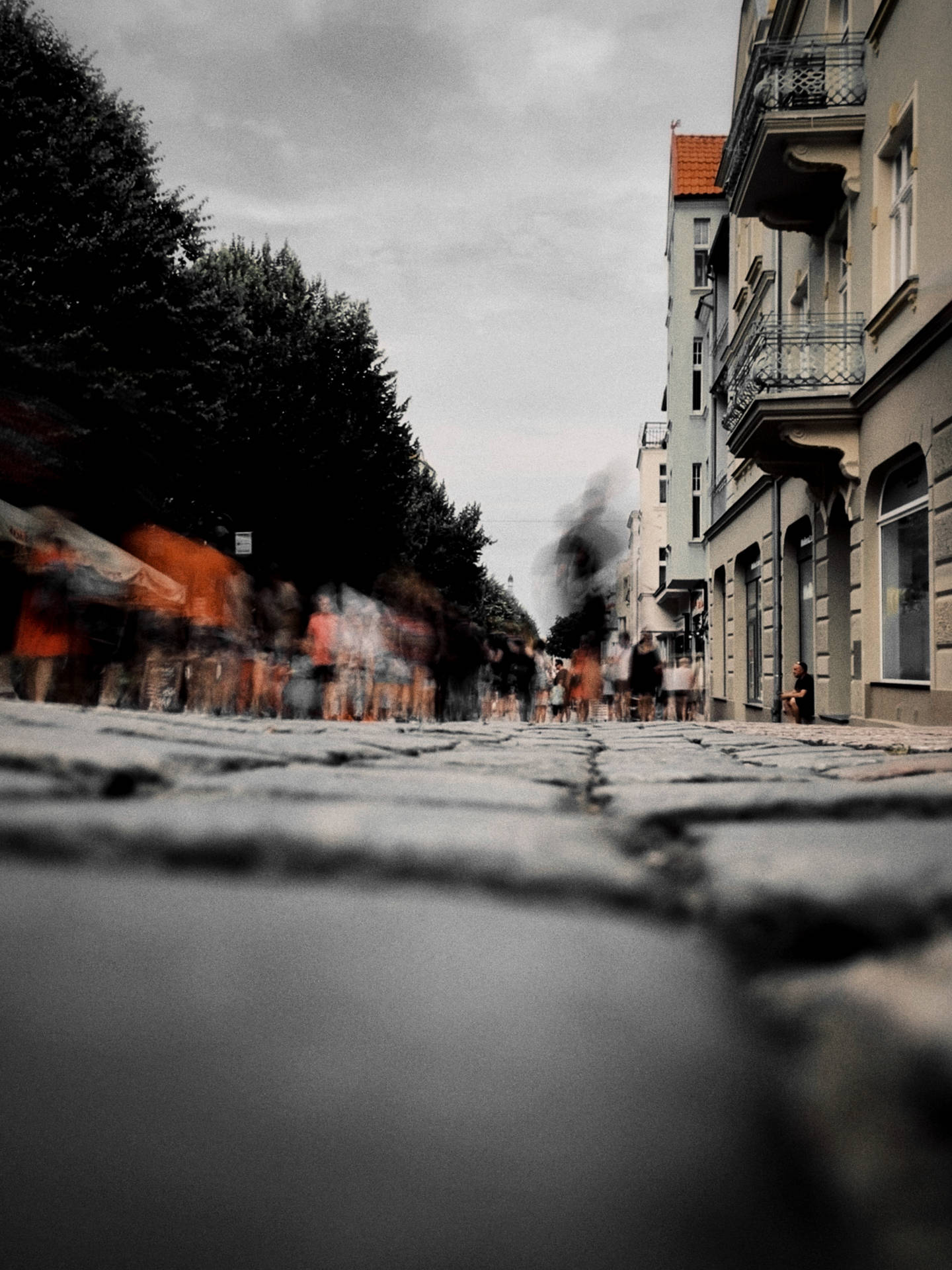 Captivating View Of A Crooked House On A Cobbled Street Wallpaper