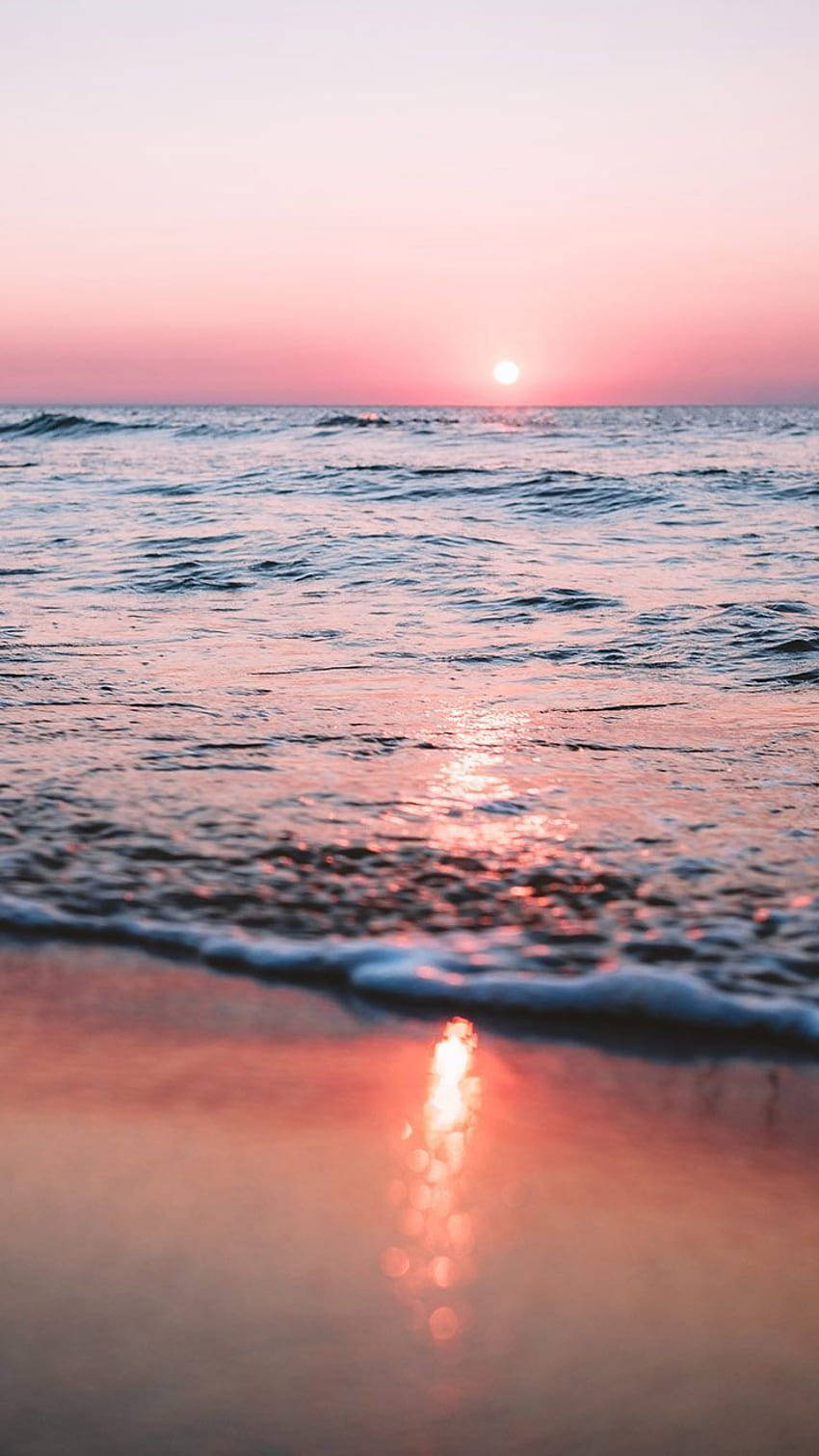 Capturing The Beauty Of A Pink Sunset On An Iphone. Wallpaper