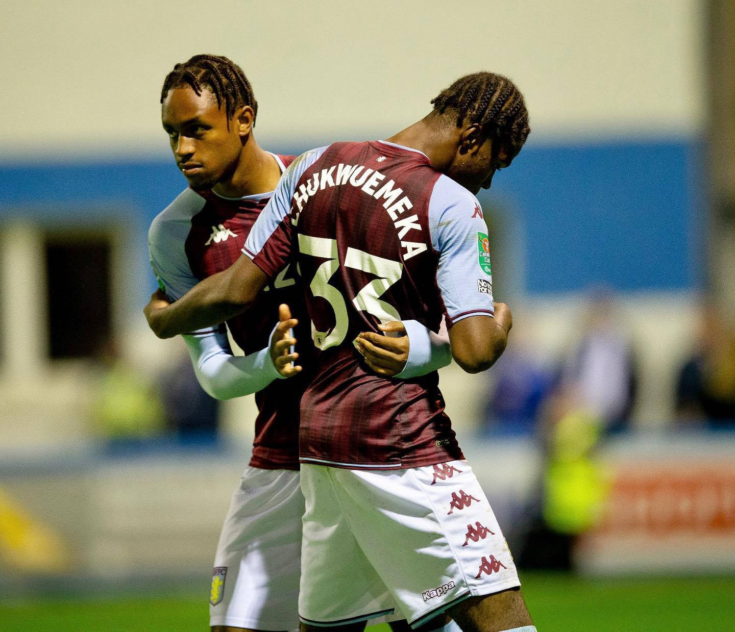 Carney Chukwuemeka Hugging Teammate Wallpaper