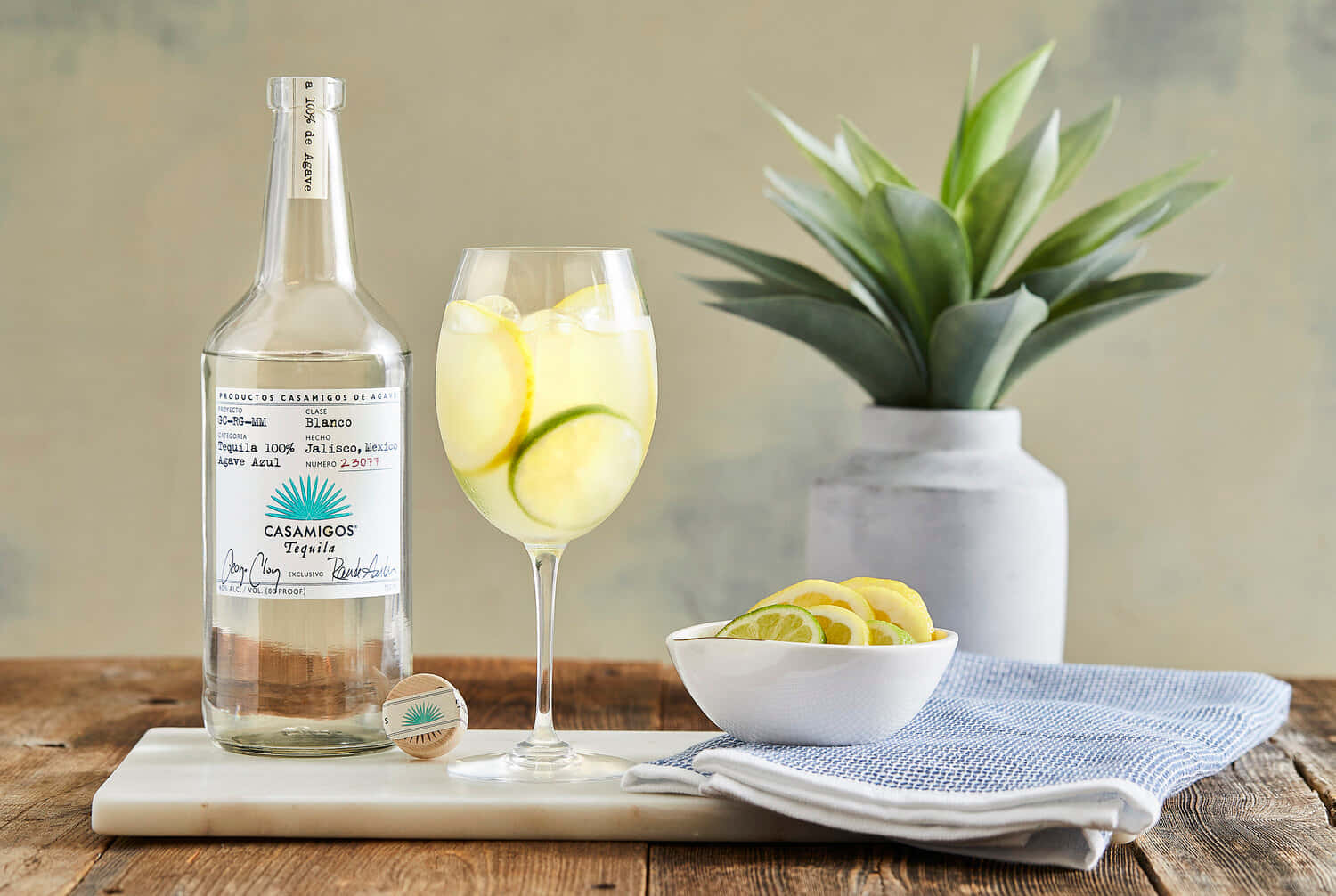 Casamigos Tequila Blanco Liquor With Lemon Lime Spritzer Wallpaper