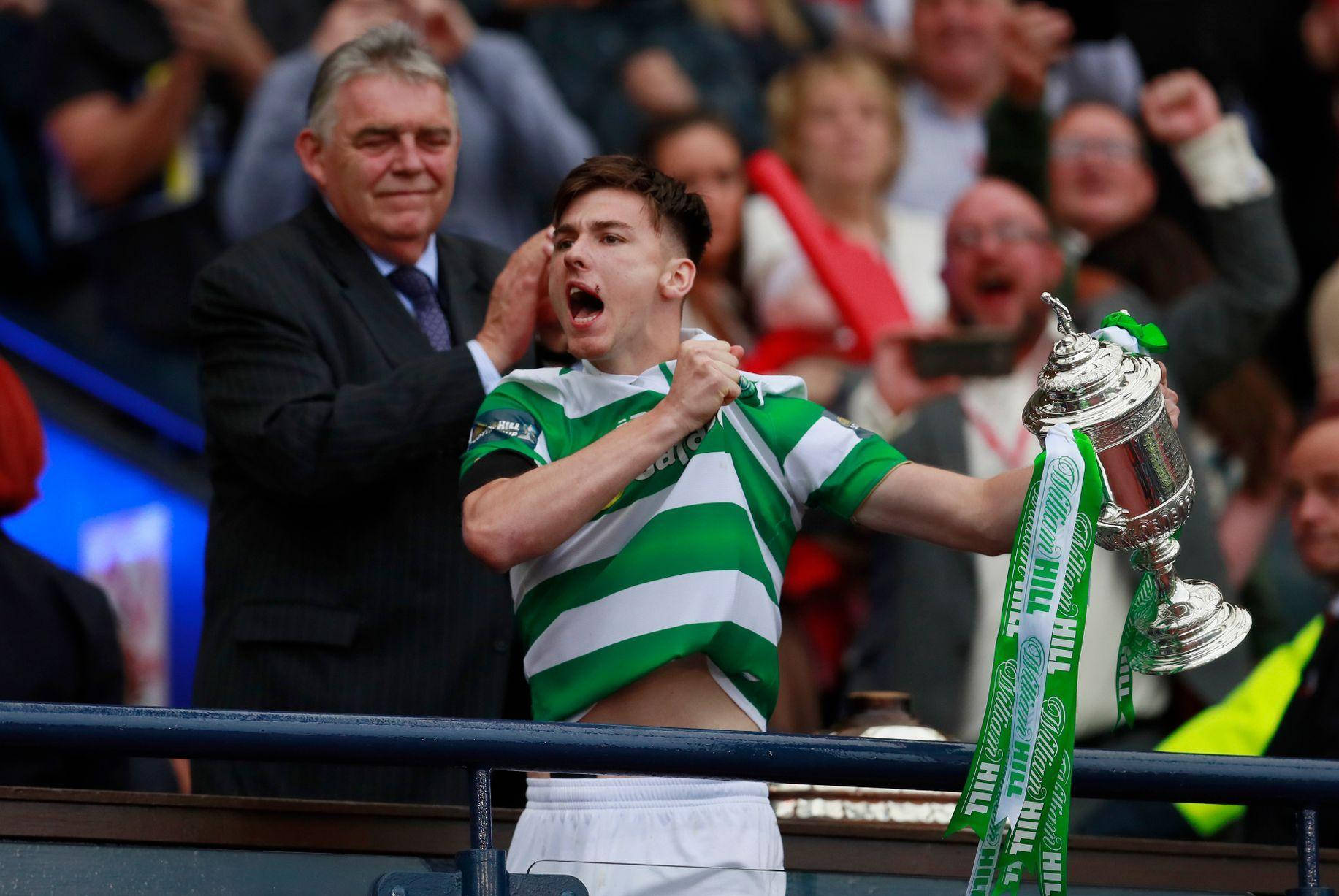 Celebrating Kieran Tierney With Trophy Wallpaper