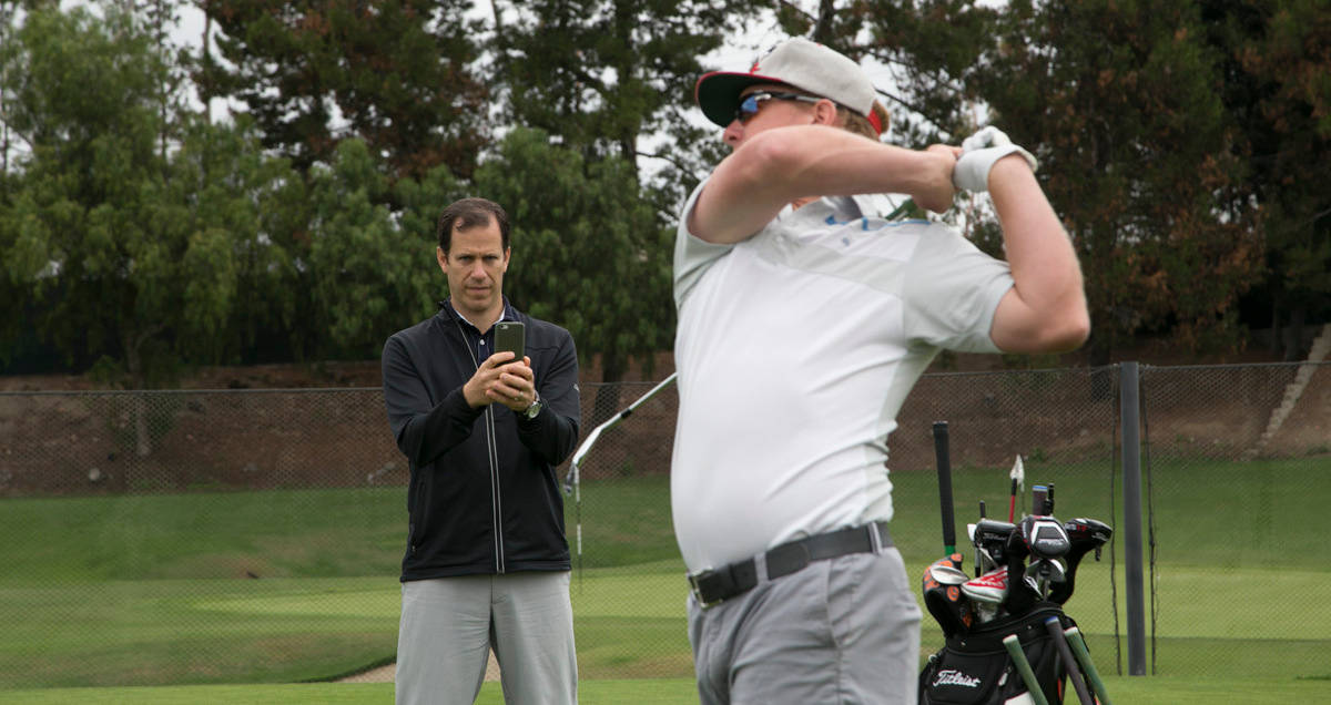 Charley Hoffman Executing A Perfect Swing On The Golf Course. Wallpaper