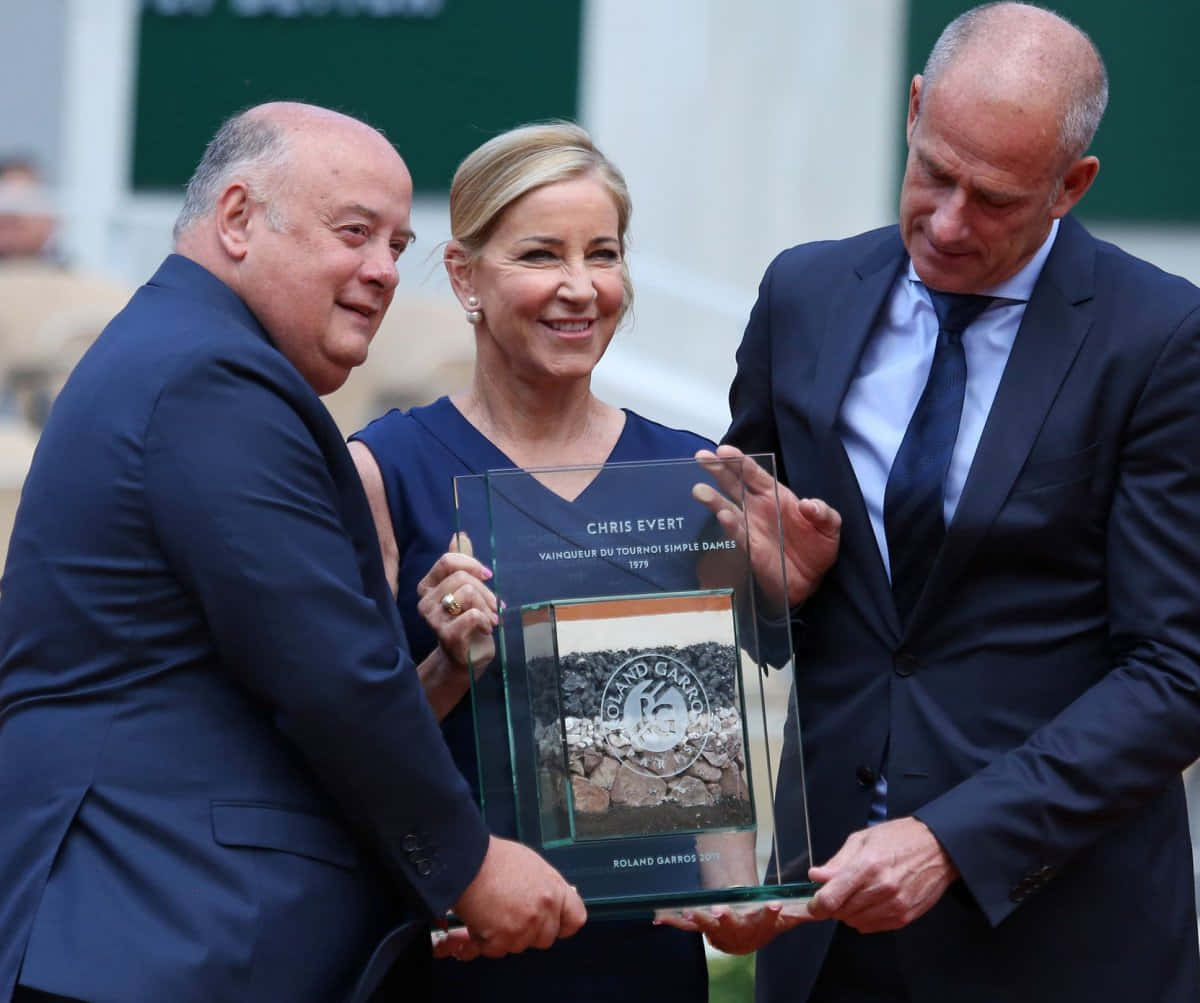 Chris Evert Receiving A Plaque Wallpaper