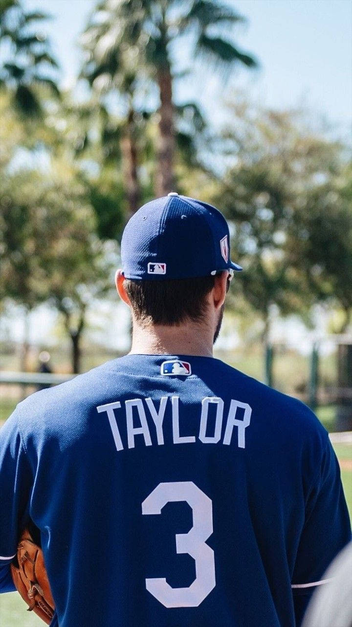 Chris Taylor In His Blue Uniform Wallpaper