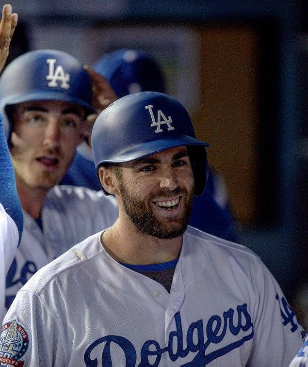 Chris Taylor Triumphantly Holds Up His Baseball Bat Wallpaper