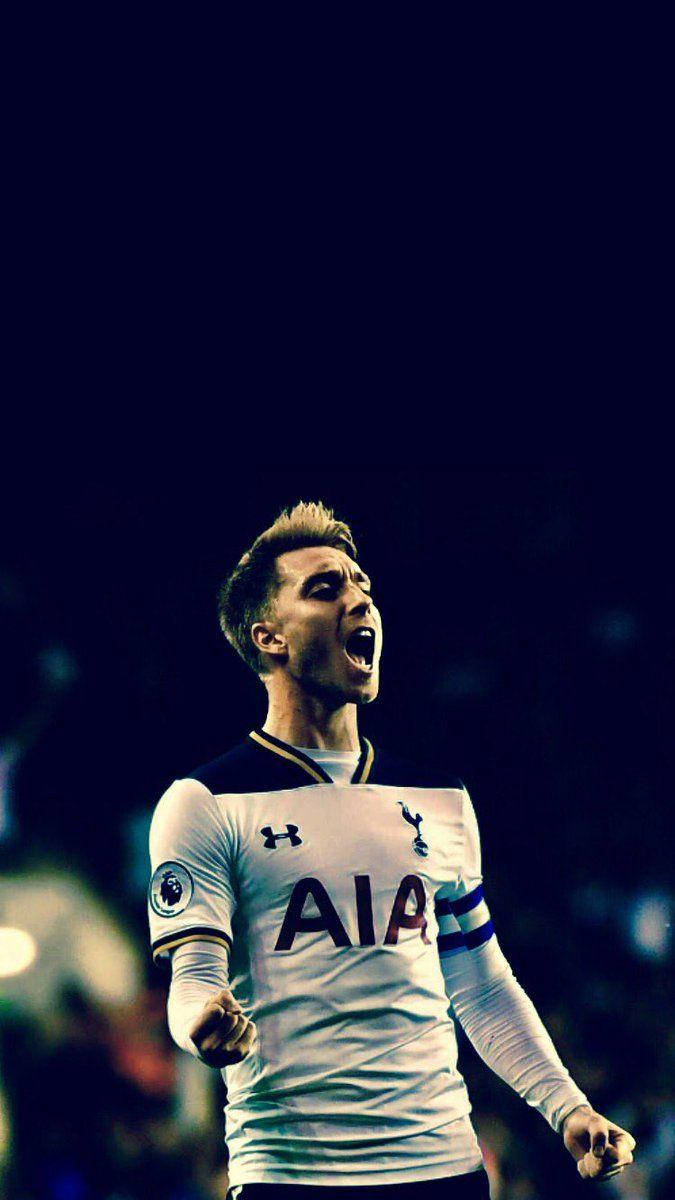 Christian Eriksen Celebrates Scoring A Goal Wallpaper