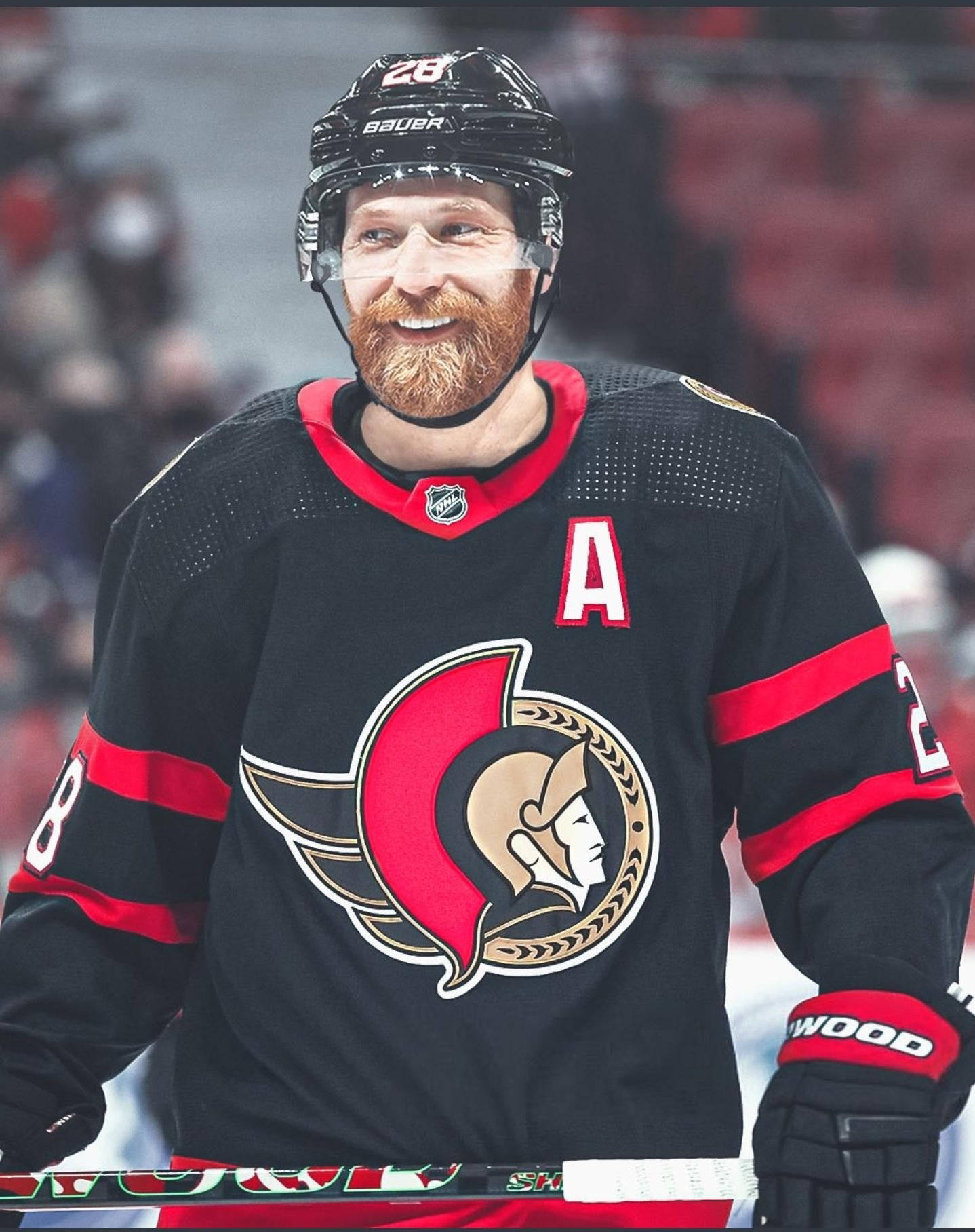 Claude Giroux Smiling At An Ottawa Senators Game Wallpaper