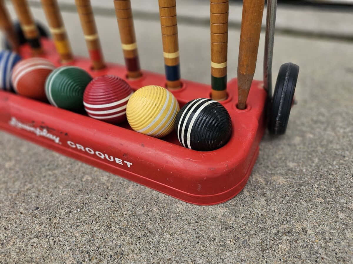 Colorful Croquet Ballsand Mallets Wallpaper