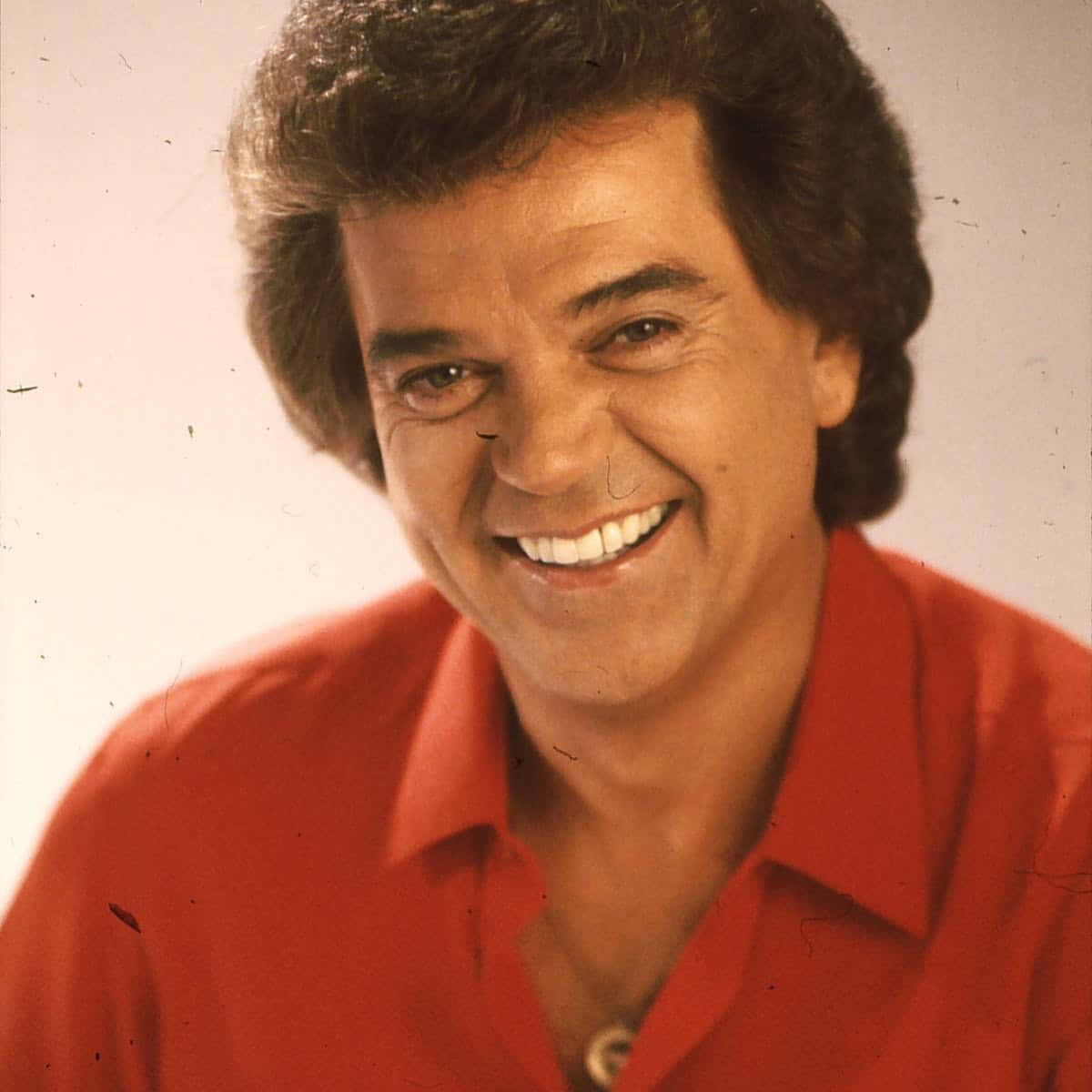 Conway_ Twitty_ Smiling_ Portrait_1980s Wallpaper